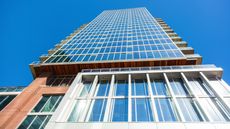 Looking up the side of a high-rise building.