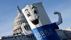 picture of a person in a Build Back Better Bill costume in front of the U.S. Capitol