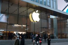 Best Apple deals are available now. Citizens are walking past an Apple store in Shanghai, China.